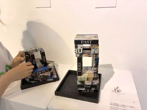 Interactive Jenga Artwork with words and collages on each piece