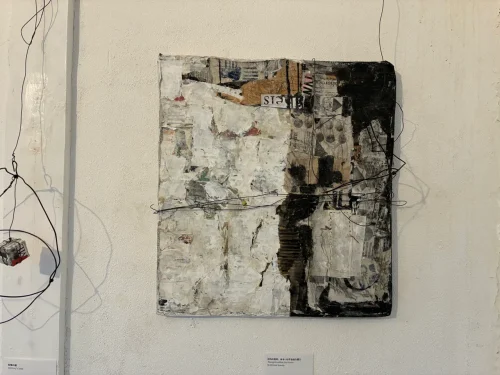 Sculpture and object installation using wires and old screws in the gallery's back room